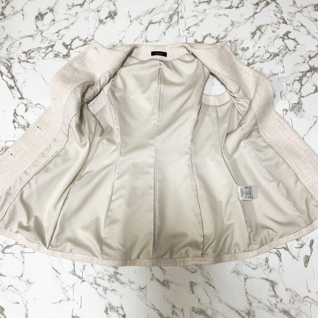 【美品】anuans フロントボタンぺプラムブラウス ベージュ