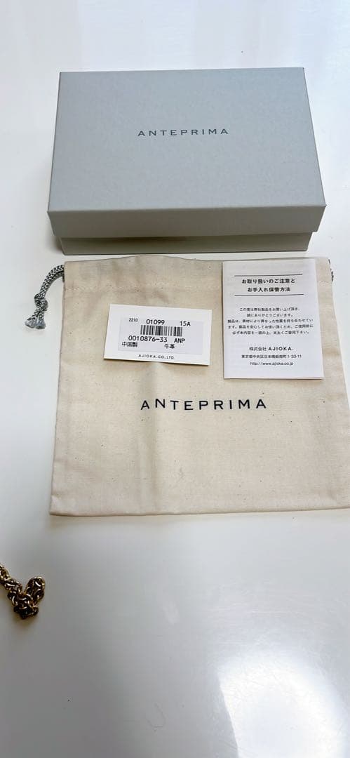 キララANTEPRIMA グレージュ　リボン型キーケース　フィオーレ