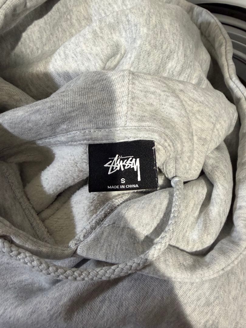 Stussy グレー フード付きパーカー