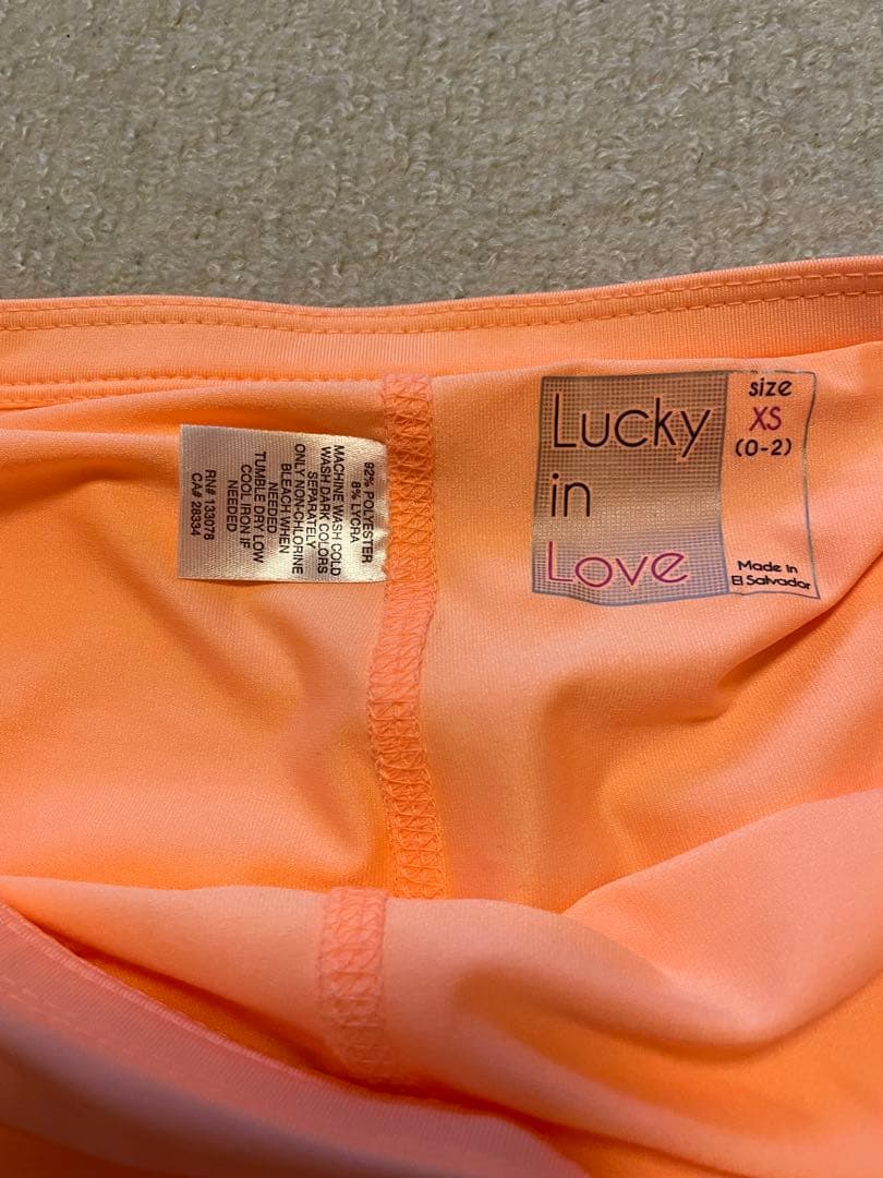ラッキーインラブ⭐️新品⭐️日本サイズＭオレンジ レース フリル アドミラルFILA