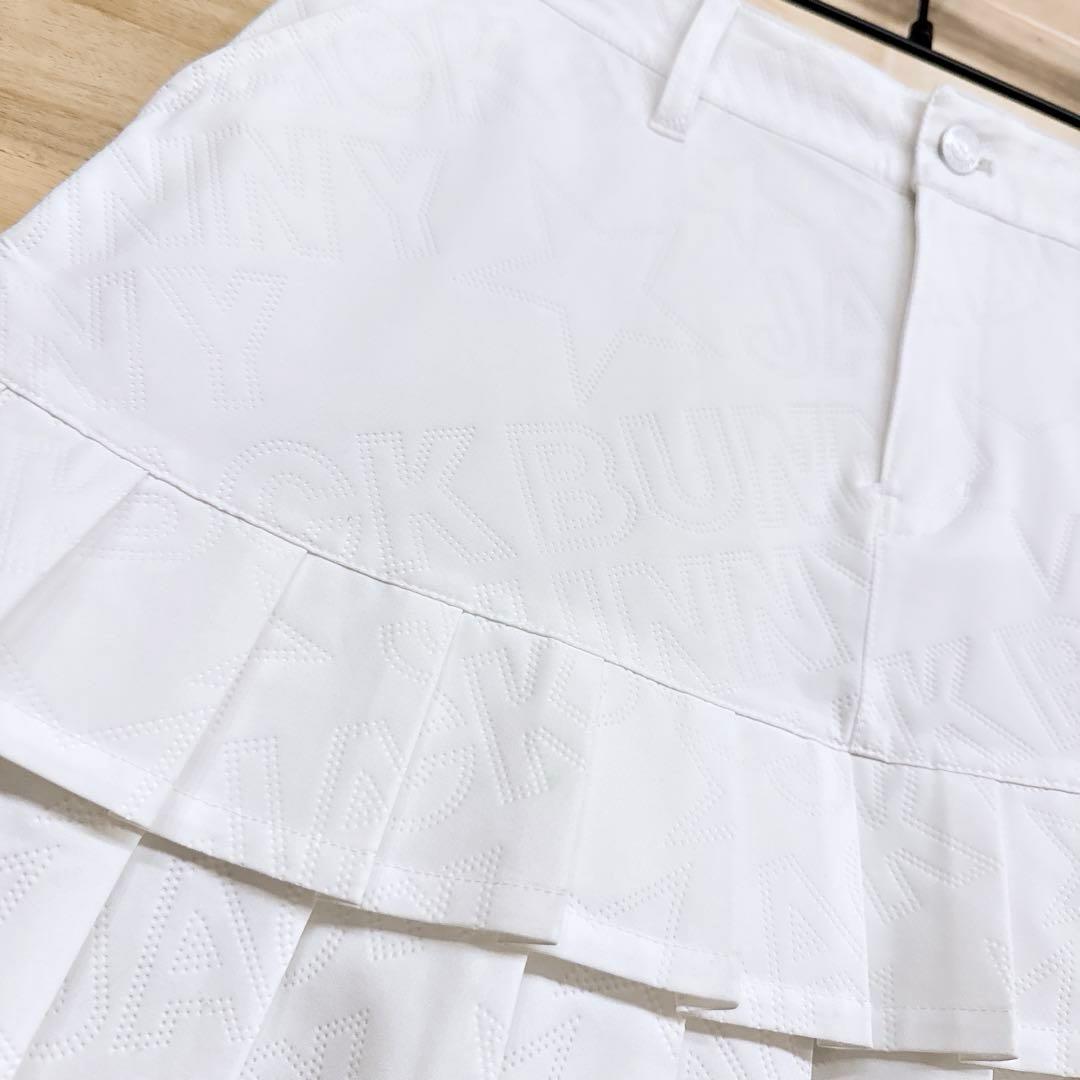 【ジャックバニー】ゴルフ デボス加工ロゴ プリーツ スカート L相当 白×黒